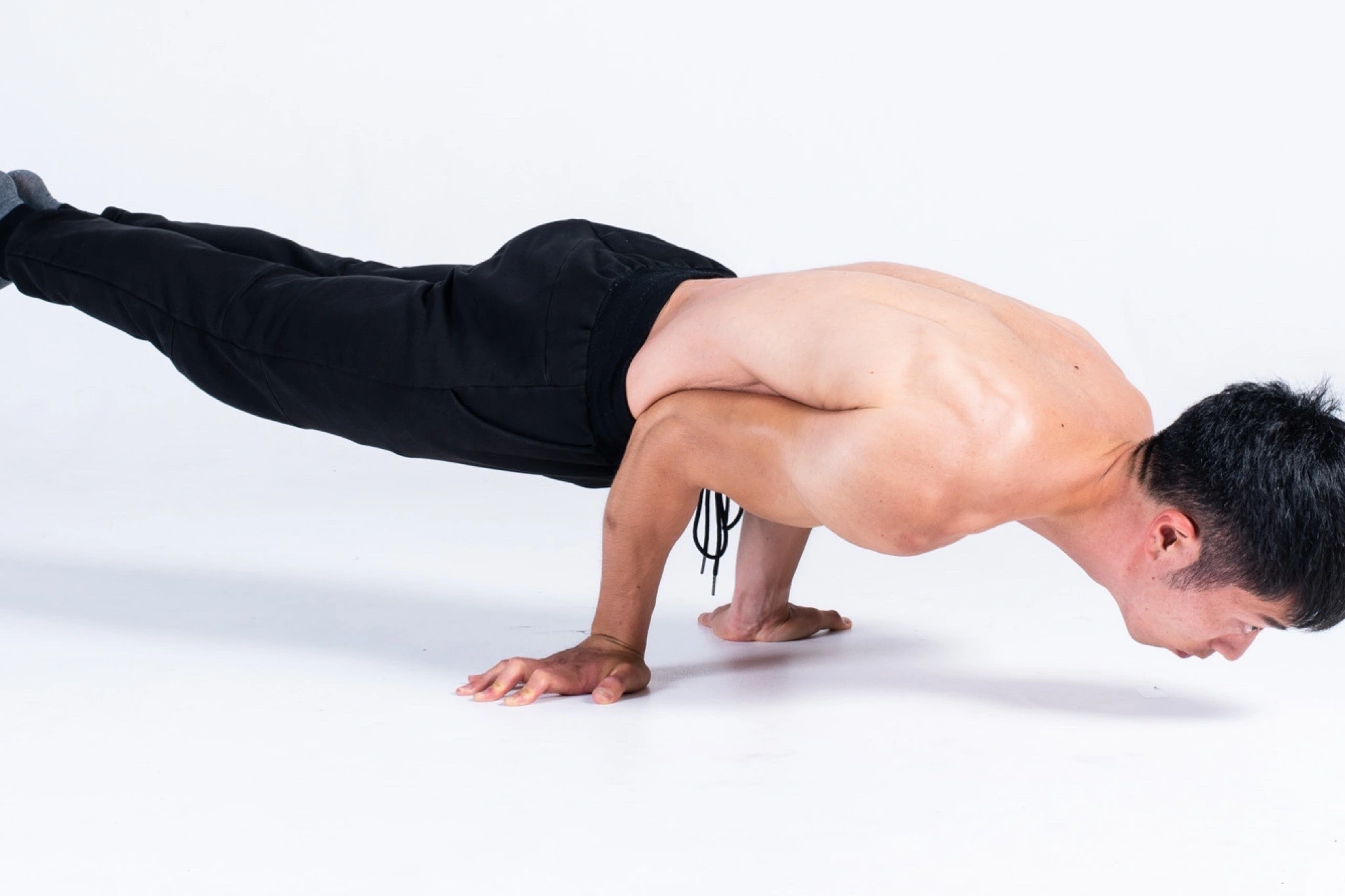 Athlete performing an elbow lever